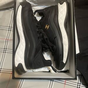 CHANEL Black Sneakers with Purple Accents